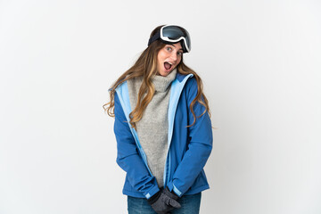 Skier girl with snowboarding glasses isolated on white background with surprise facial expression