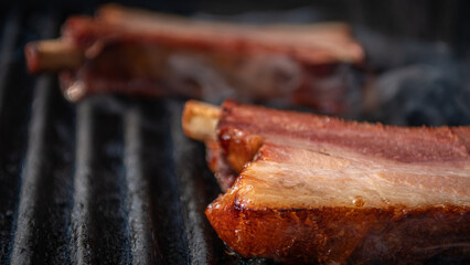 Isolated close up of delicious pork spare ribs roasted on the grill