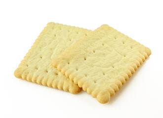 Two buttery square shaped tea biscuits isolated on white background