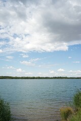 Clouds in the blue sky on the background