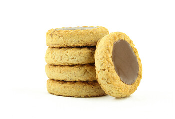 Mini chocolate tart biscuits. Stack of choco cookies isolated on white background