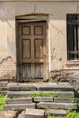 Old door of a abandoned house.