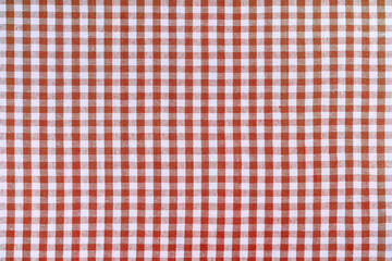 Red classic checkered tablecloth texture, background with copy space. Background texture checkered...