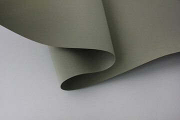 Abstract green paper wave on white background with copyspace