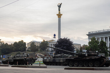 Fototapeta na wymiar Exhibition of destroyed Russian tanks and other military equipment in the center of Kyiv on the Independence Day of Ukraine