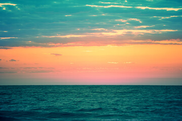 Naklejka na ściany i meble Seascape in the early morning. Sunrise over the sea