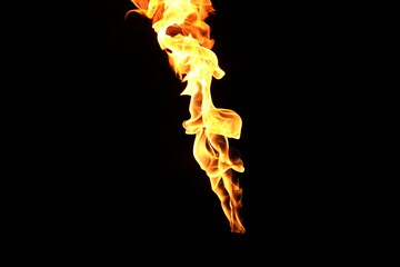 Yellow fire flames isolated on a black background