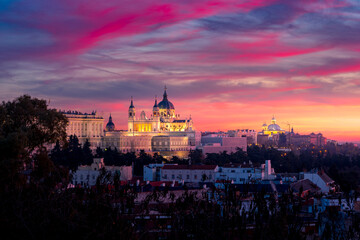 Old stone building in city with sunset sky