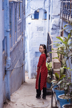Asian woman on street of Blue City