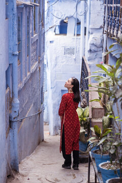 Asian woman on street of Blue City