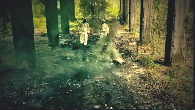 Polluted, post nuclear area with abandoned warehouse and colorful smoke. Scientist in safety uniforms looking for samples
