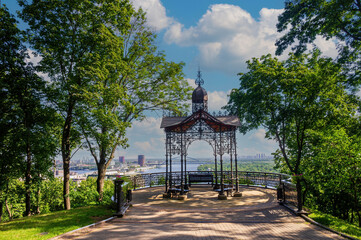 Kokorev Gazebo in the St. Volodymyr Hill in Kyiv, Ukraine. Scenic view of wrought iron metal gazebo...