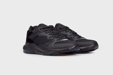 Black classic leather high sole sneakers isolated on white background. Women's laced footwear, sports basketball running shoes, boots for female, women. Template, mock up