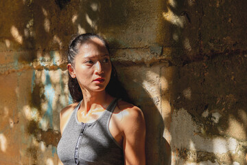 Portrait of a fit and healthy Asian woman in fashion sportswear