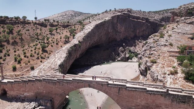 Aerial view of Severan Bridge and Chabinas creek at Adiyaman province, southeastern Anatolia, Turkey. Cendere bridge or Chabinas bridge is a late Roman bridge located near the ancient city of Arsameia