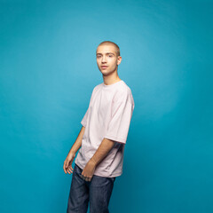 Portrait of young man on blue background