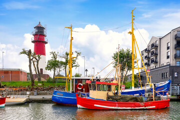 Small fisher boats are moored in the harbor of Büsum in North Frisia, Germany