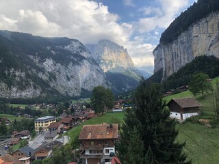 Fototapeta na wymiar Lauterbrunnen valley panoramic view, Swiss Alps, Switzerland, summer 2022. Most beautiful Swiss landscape photos and popular Switzerland tourist destinations. Alpine scenery