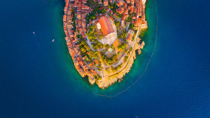 Rovinj, Croatia. Aerial view. Old historic buildings in the bay. Harbor with boats. Beautiful...