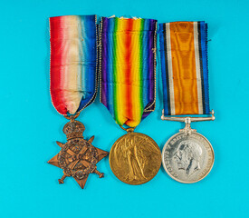 One soldier's group of three British campaign medals from World War I.  The 1914 Star (aka Mons Star) was given for members of the British Expeditionary Force for action early in WWI.