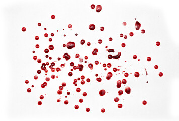 Drops of blood staining spots on a white background, medecine, drug addiction, killing