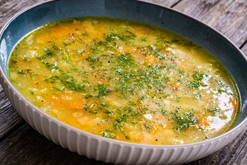 Cucumber soup on wooden table
