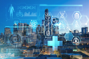 Illuminated aerial cityscape of Seattle, downtown at night time, Washington, USA. Health care digital medicine hologram. The concept of treatment and disease prevention