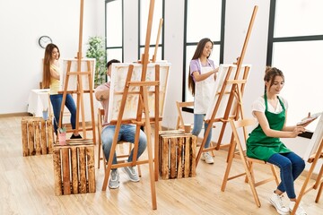 Obraz premium Group of people smiling happy drawing at art studio.