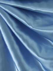 blue wave curtain and soft shadows. Beautiful rippled textile fabric. Luxurious. Soft, light, fluttery blue fabric texture. Abstract background on isolated.