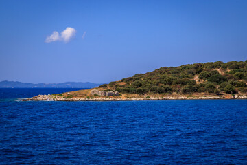 Fototapeta na wymiar Prasoudi - a small uninhabited island close enough to the Port of Igoumenitsa