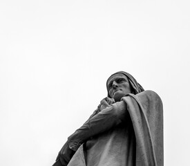 Naklejka premium Detail from Dante Alighieri monument at the center of Piazza dei Signori, in Verona (19th century), with copy space - Verona city - northern italy