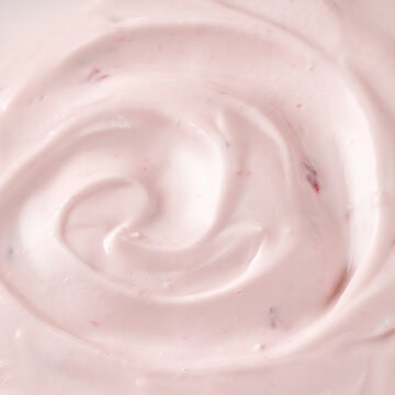 Curl of Yogurt. Empty pink nature yogurt, sour cream, ice cream. Simple and minimalistic. Yogurt with strawberries or raspberries. Delicious liquid Texture.