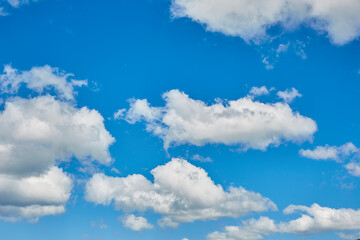Obraz premium Light blue sky with fluffy clouds. Texture resource for matte painting.