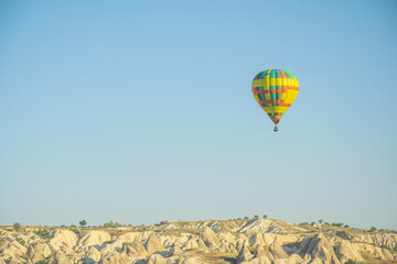 Hot air balloon flight over Cappadocia, Turkey, Goreme village, hot air balloon parade