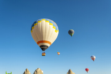 Hot air balloon flight over Cappadocia, Turkey, Goreme village, hot air balloon parade