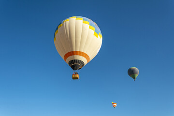 Hot air balloon flight over Cappadocia, Turkey, Goreme village, hot air balloon parade