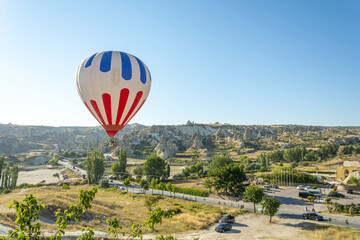 Hot air balloon flight over Cappadocia, Turkey, Goreme village, hot air balloon parade