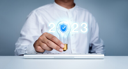 Shining 2023 calendar year numbers, neon style with cyber security, shield icon in creative trend...