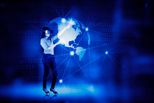 Businesswoman touching a globe in the cyberspace