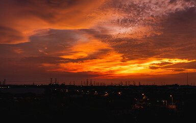 Naklejka premium red sunset over the city