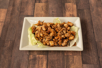 Teriyaki chicken is a cooking technique in Japanese cuisine in which food is baked or grilled in a sweet marinade sauce.