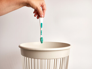 The toothbrush is discarded for disposal and recycling
