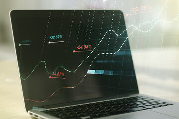 Abstract creative stats data concept on modern laptop background. Multiexposure