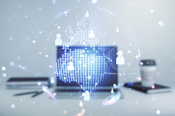 Social network concept with world map and modern laptop on background. Multiexposure