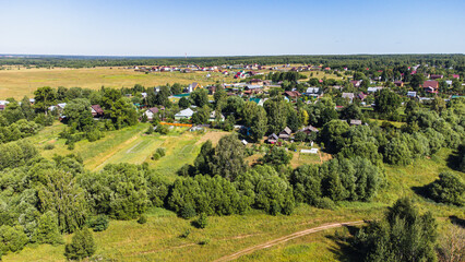 Naklejka premium view from a height on a rural landscape with houses