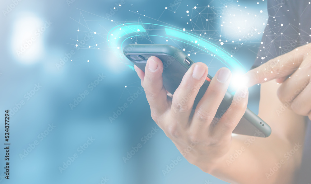 Aufkleber technology innovation and communication concept of a man using a mobile smart phone digital internet