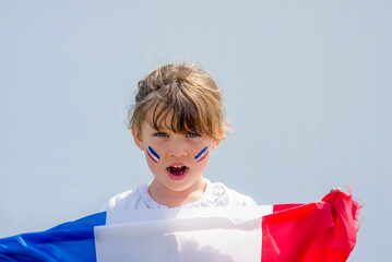 Beautiful little girl with a France flag and her tricolor makeup - 524878000