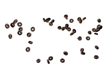 Chocolate rings cereal spill out into a bowl. Breakfast.