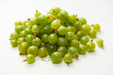 A group of gooseberries isolated on a white background.