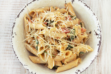 Gluten Free Penne Pasta Dinner In Rustic Bowl Close Up